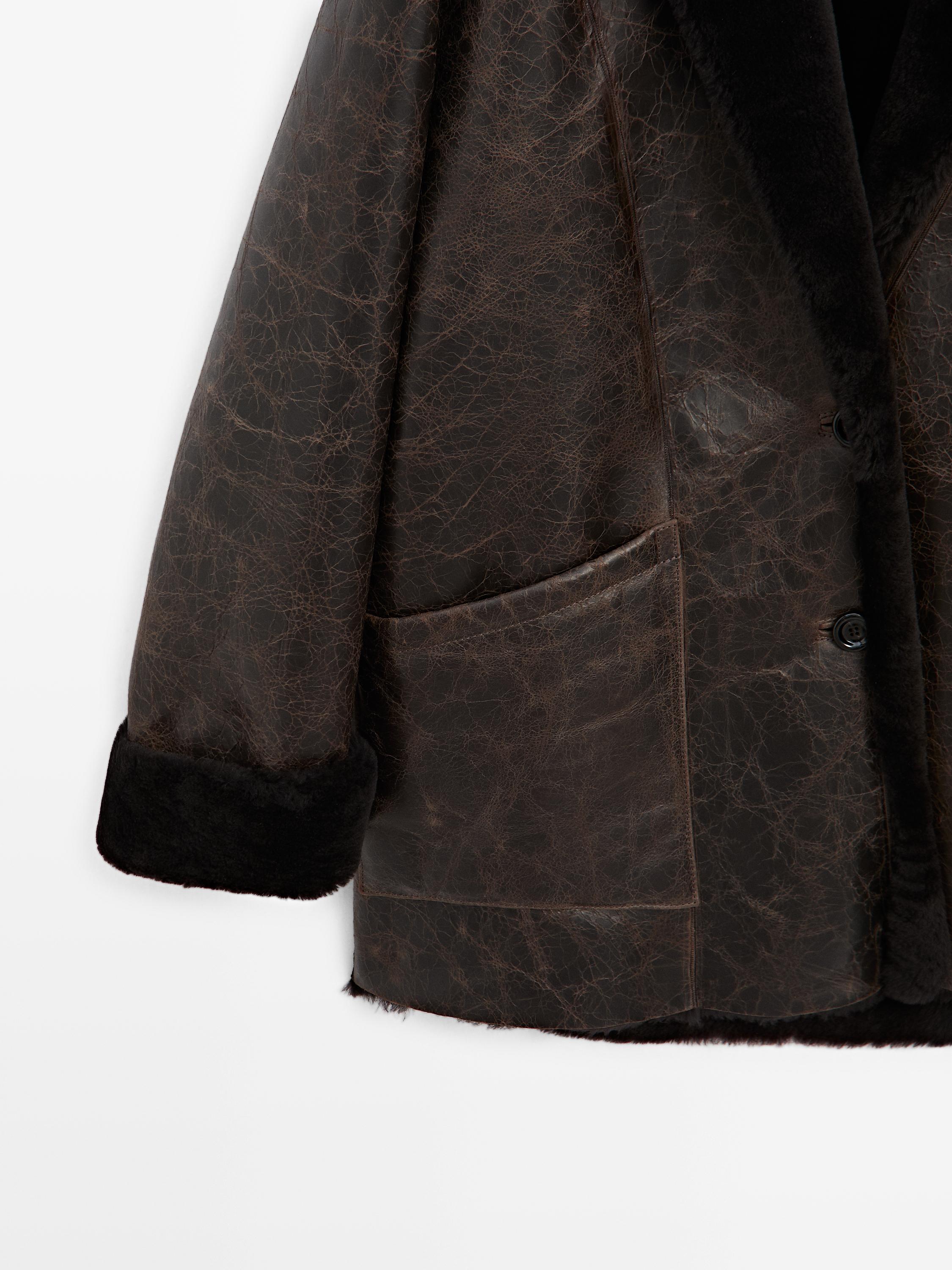Mouton leather coat with crackled finish